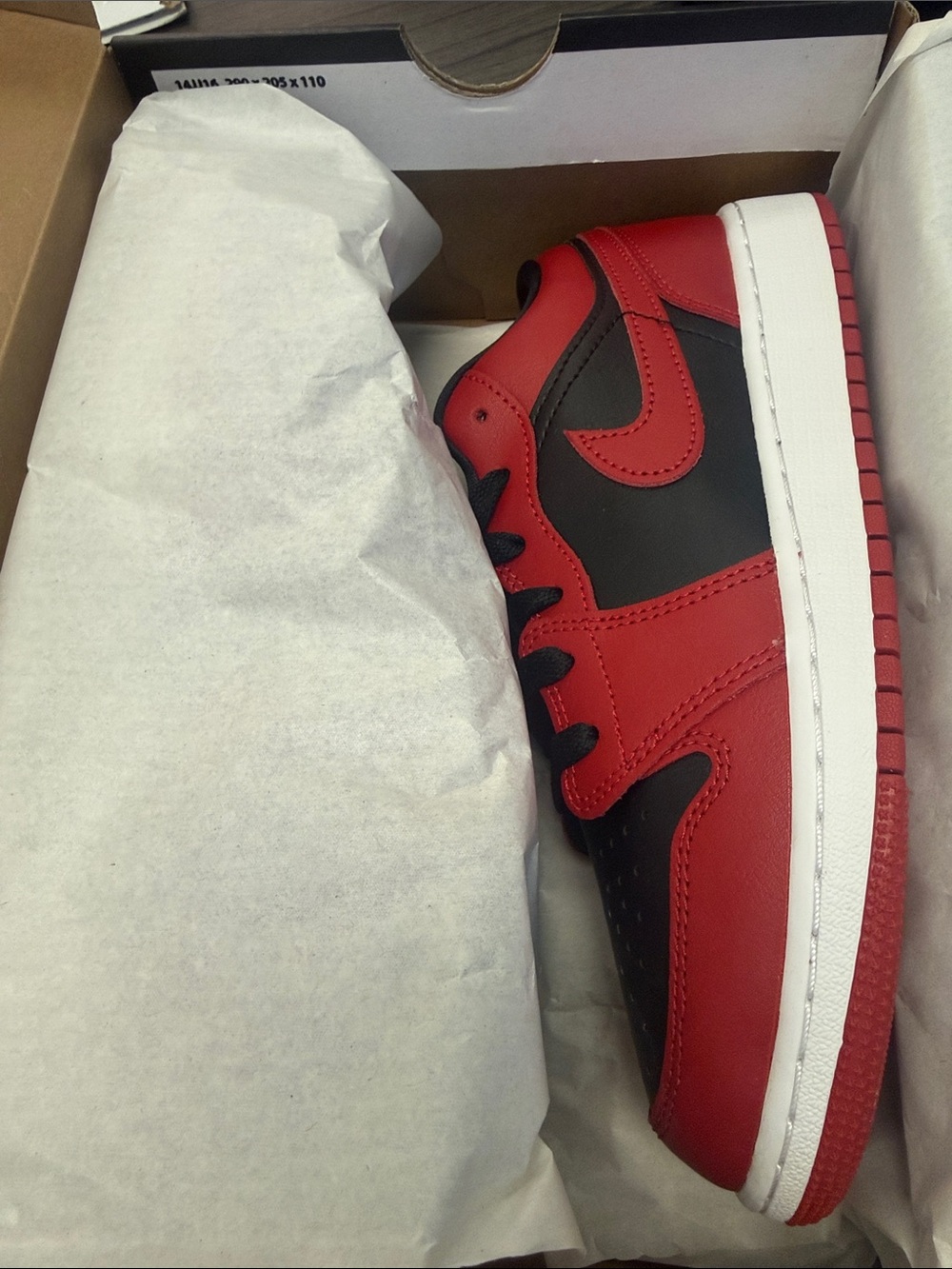 Nike Air Jordan 1 Low in Red and Black